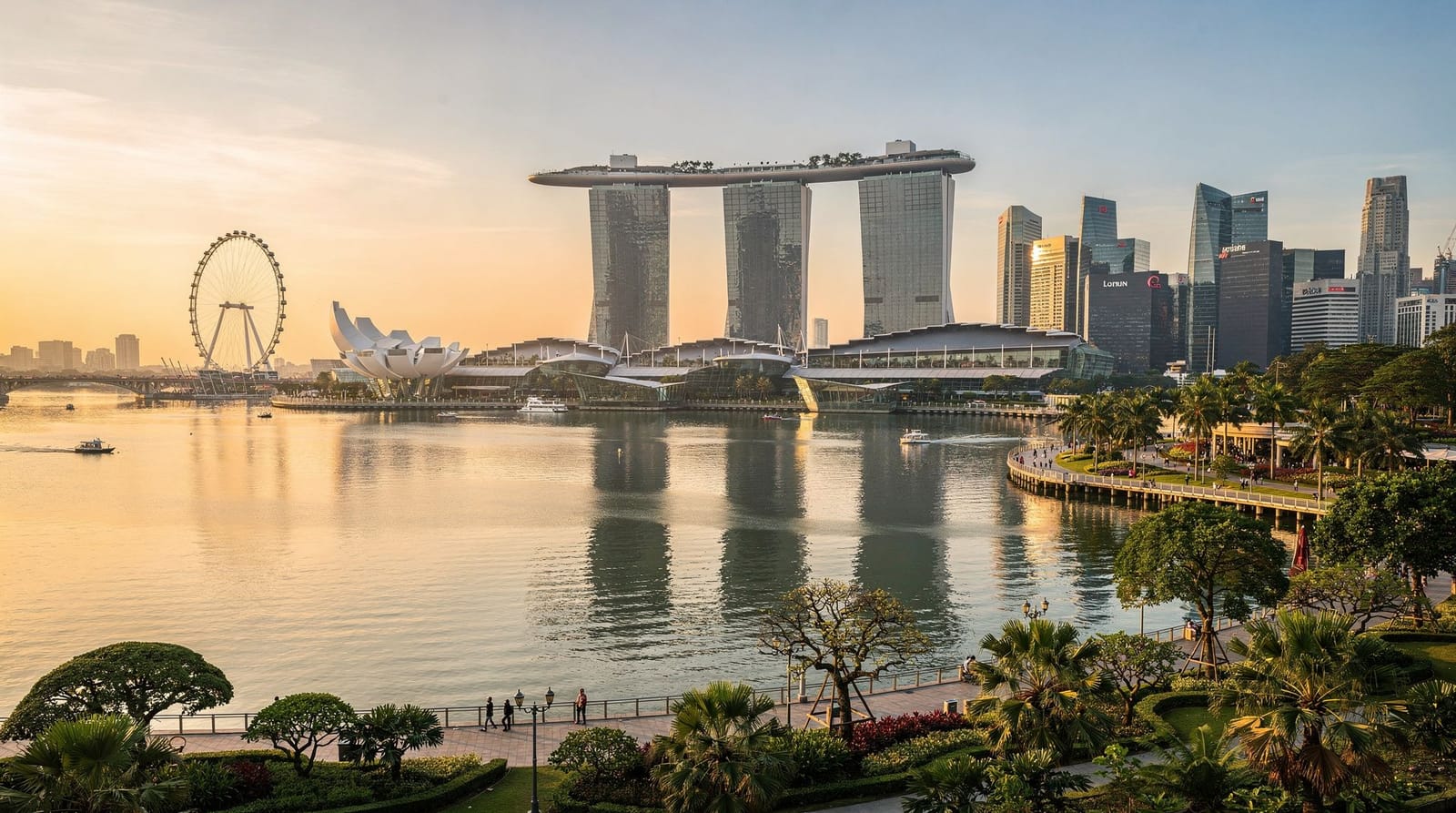 Singapore — Marina Bay Sands, the Gardens by the Bay Supertrees and the skyline at golden hour
